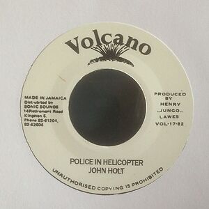 Police In Helicopter by John Holt